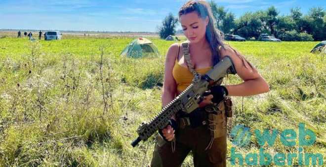 Orduya katılan Ukraynalı güzellik kraliçesi eline silah alıp düşmanlarına gözdağı verdi