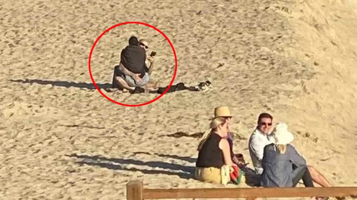 Kourtney Kardashian ve nişanlısı Travis Barker plajda sarmaş dolaş görüntülendi