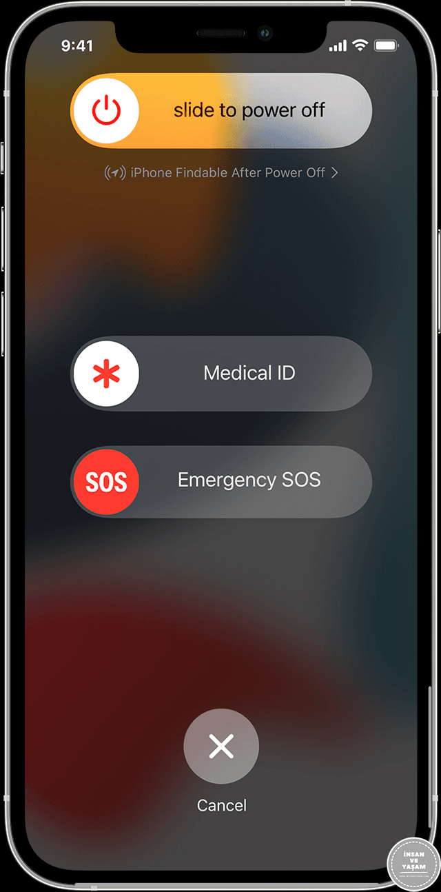 iPhone ana ekranındaki SOS düğmesi ve Tıbbi Kimlik düğmesinin yanı sıra kapatma düğmesi